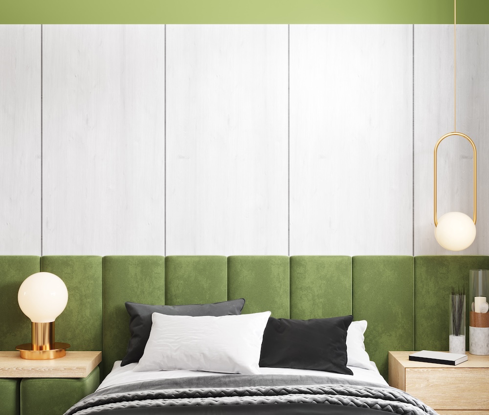 panele z zielonego weluru za łóżkiem  łóżko z welurowym panelem za zagłówkiem w zielonym kolorze